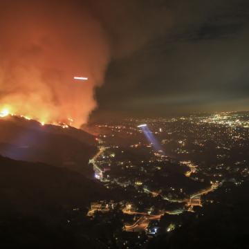 Wildfires Approaching the City in the Night